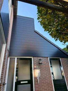 Aanbrengen gevelbekleding (keralit) in Almkerk