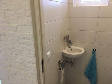 Renovatie toilet en hal Zeewolde