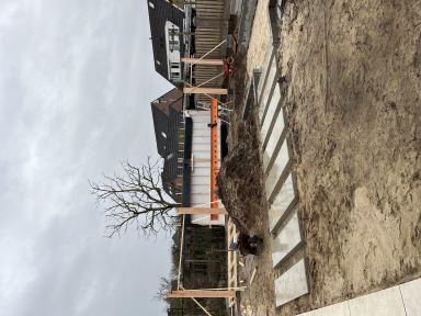 Overkapping 14 meter lang bij 4 meter diep in escharen