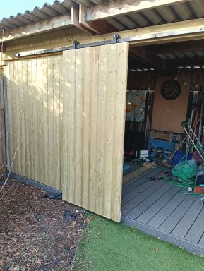 Grote Wielen: van veranda naar schuur met boeren Barnwood schuifdeur