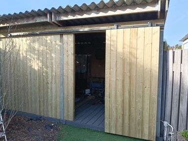 Grote Wielen: van veranda naar schuur met boeren Barnwood schuifdeur