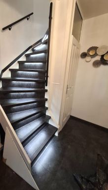 Deze trap mogen voorzien van een nieuwe en strakke look in Rozenburg!