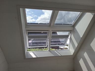 Mooie dakvenster mogen plaatsen voor een klant