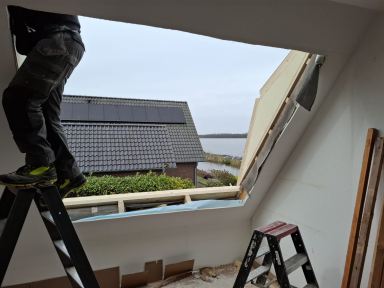 Mooie dakvenster mogen plaatsen voor een klant